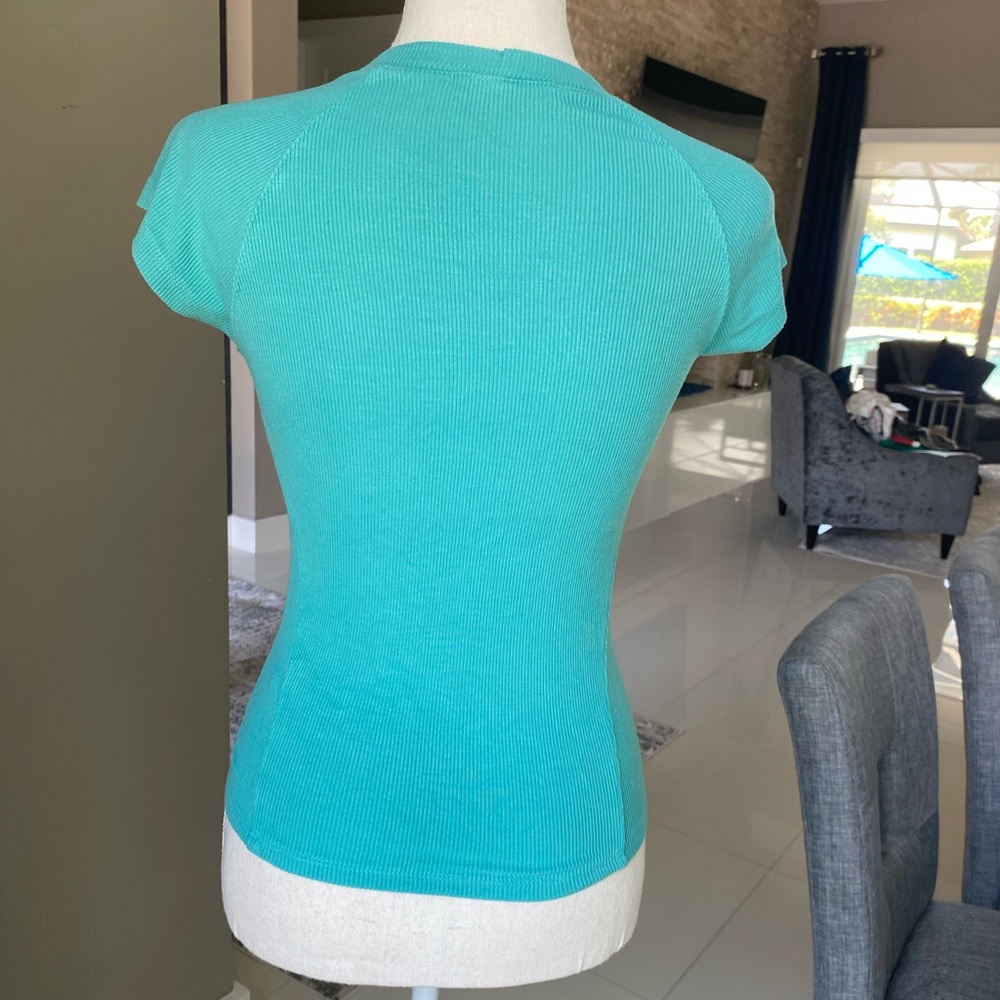 Blue form fitting T-shirt